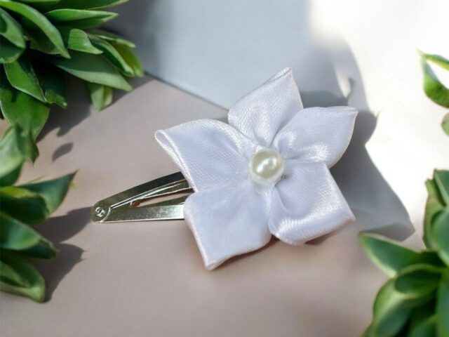white ribbon pin