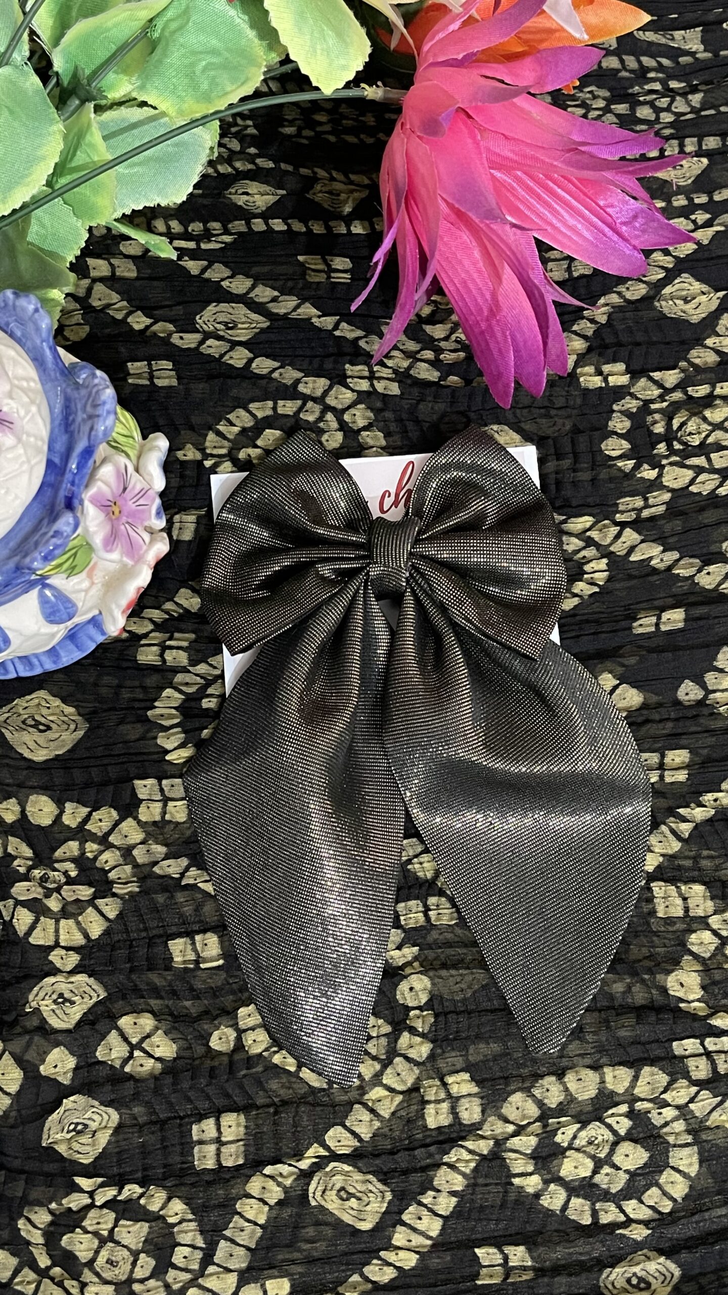 black tail bow pin