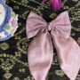 pink tail bow pin pink tail bow pin