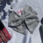 Silver fancy sm tail Bow Clip